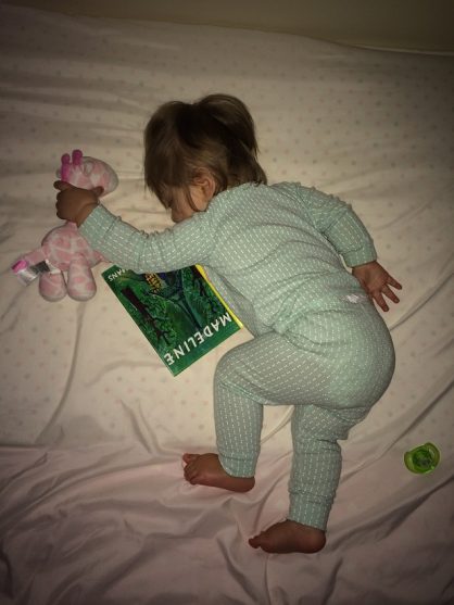 Madelyn Sleeping with the Madeline book